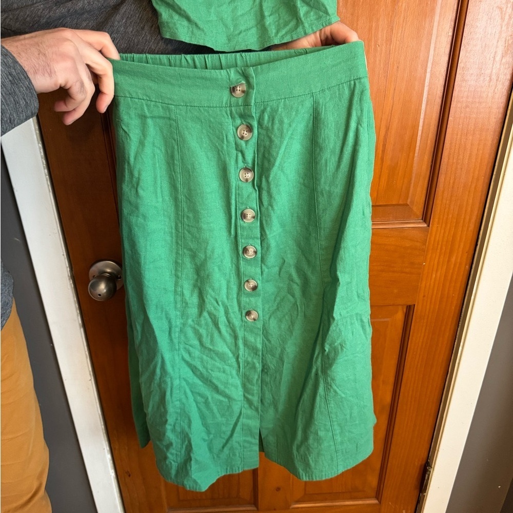 green buttoned midi skirt